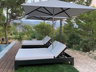 Double beds with integrated parasol